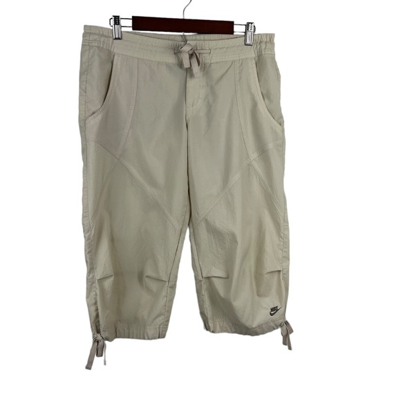 𝅺nike CROPPED CARGOS WITH TIE‎ HEMS - Picture 1 of 9